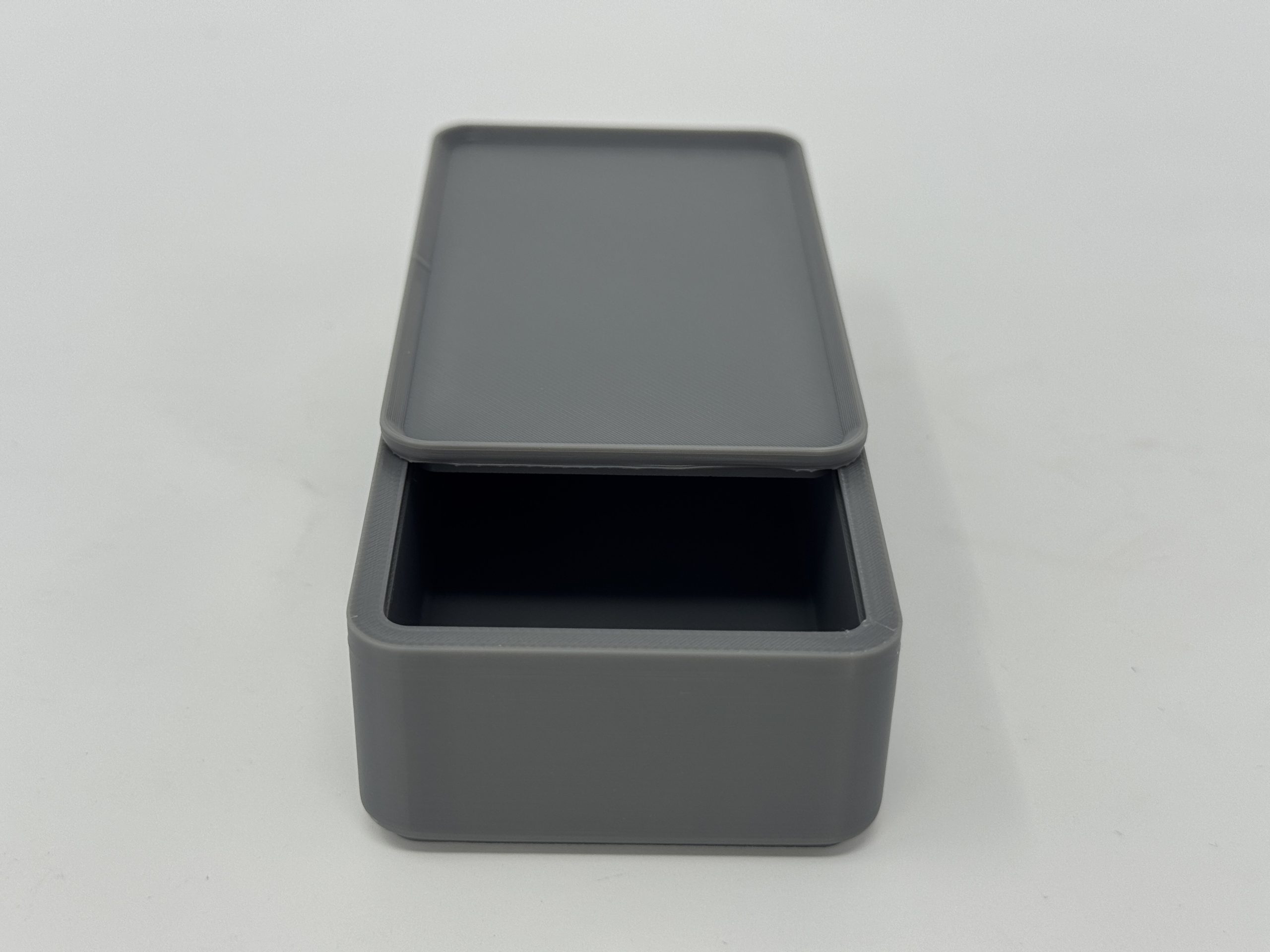 Caja Guarda-Recursos “Cierre Seguro” (10×6×3 cm) - componentes del juego de mesa